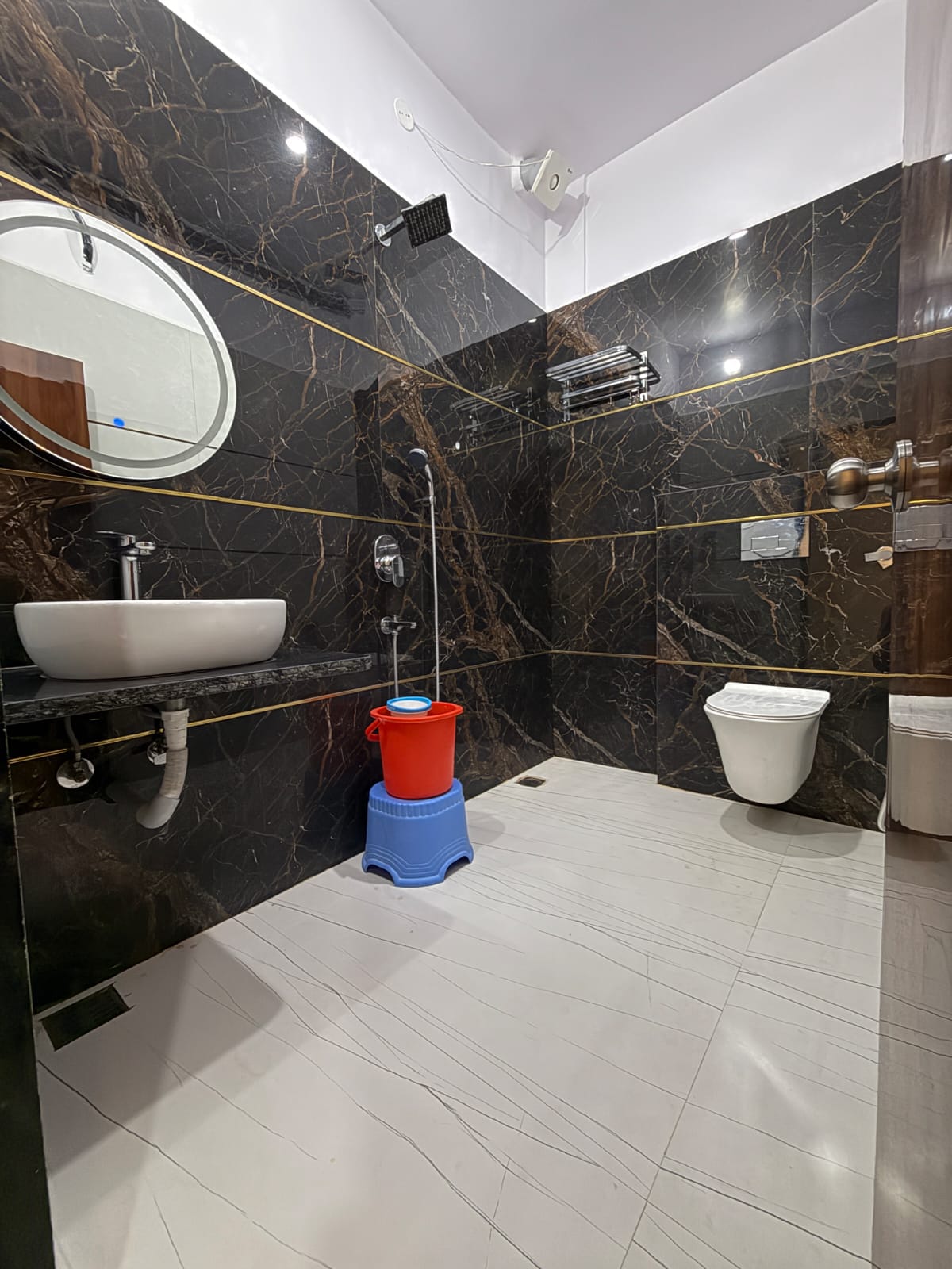 Marble bathroom with rainfall shower